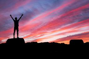 Rocks Man pink red sky