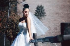 bride posing on a sunny day