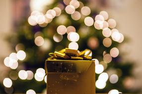 gift in gold packaging for christmas
