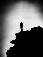 photo of Alone Man on cliff