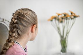 Girl Looking at Bouquet