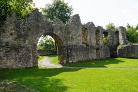 gateway of ruined medieval castle at Summer