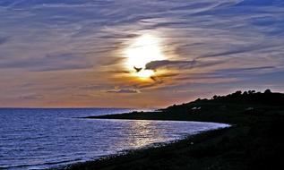 Beautiful coast of the Baltic Sea, in Denmark, at colorful and beautiful sunset