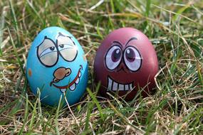 Easter Eggs face grass
