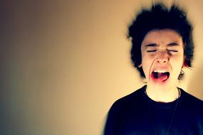 screaming young man in stress