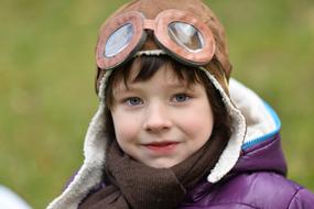 portrait of a boy in nature on a blurred background