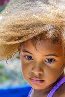 african american little girl with curls close up