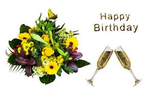 happy birthday on card with flowers and champagne