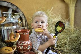 Boy Cute at a tea party on straw