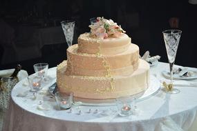 Beautiful and colorful decorated wedding cake on the table