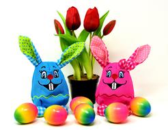 colorful easter bunnies as funny figurines