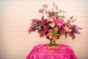 Bouquet of Flowers on pink tablecloth