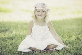 little girl in a vintage look in summer