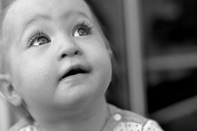 black and white portrait of a happy child