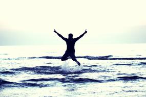 Happy Boy Flying over beach