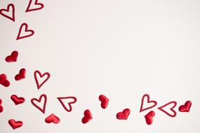 Beautiful red and pink Hearts, at corner of pink background, Valentineâs day greeting