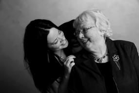 black and white portrait of two happy women