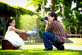 happy mom and daughter at the photo session