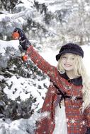 photo near a tree under the Christmas snow