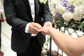 Happy wedding couple at altar