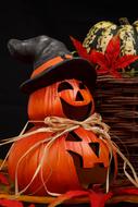 Colorful and beautiful Halloween still life with the pumpkins with decorations, in the autumn