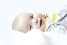 smiling baby in a white background