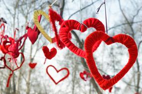 decoration in the form of hearts on a tree in winter