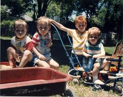 young Cousins Play Outside