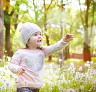 Girl at Dandelion field