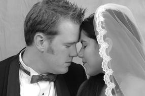 Black and white photo of the bride and groom in costumes, together