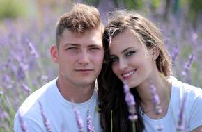 couple posing on lavender field