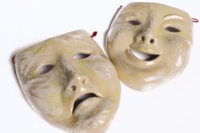 porcelain masks of sadness and joy