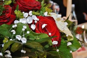 Close-up of the beautiful and colorful Bridal bouquet with flowers and leaves