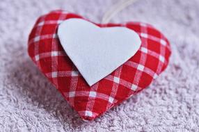 checkered pillow with white heart