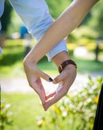 heart from the hands of the newlyweds