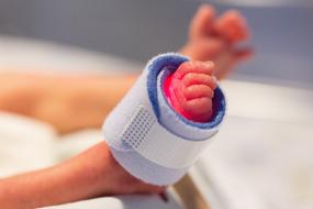 Close-up of the feet of a preemie child, in the hospital
