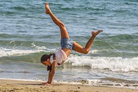 Girl Exercise on beach Outdoor