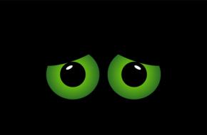 Shiny, green and black eyes, among the darkness, clipart