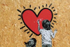 graffiti, girl draws a red heart