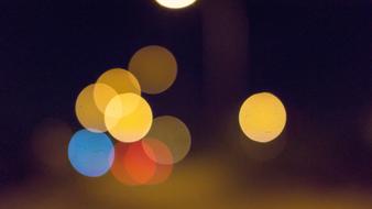 Beautiful and colorful bokeh lights among the darkness
