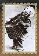 old photo of a little boy with an accordion