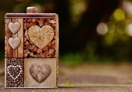 decorative Box with Hearts on side at blur background