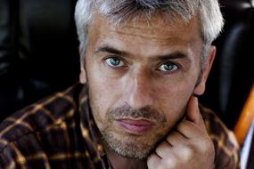 handsome grey hair man looking straight