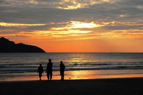 Family at Sunset by Beach