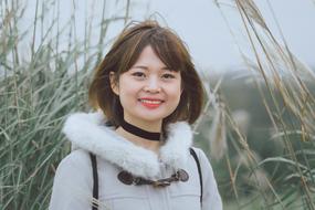 Portrait of Cute Girl on field