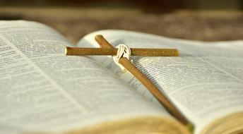 Cross on Bible Easter Good