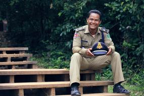 happy male police officer in sri lanka