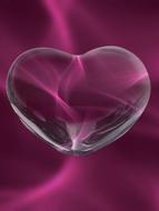 glass heart on dark pink background