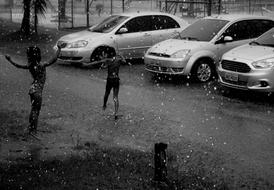 Child on street at Rain