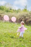 Little Girl With Balloons at Summer